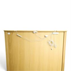 Ercol - 'Artisan' light oak dresser, upper section with cantered corners, with central open area fitted with adjustable glass shelves, flanked by twin glazed cabinets with further adjustable glass shelving, the lower section with three shorts drawers with recessed handles, above three cupboard doors with recessed handles enclosing adjustable wooden shelves, raised on short tapering supports 