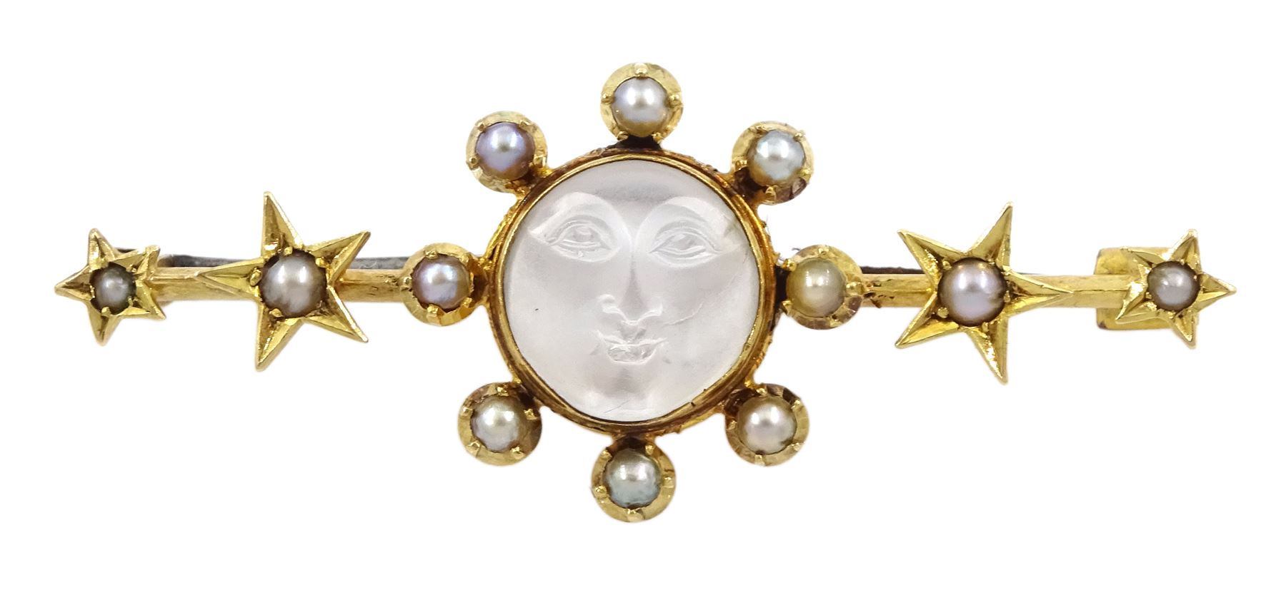 Victorian 15ct gold moonstone and seed pearl brooch, the carved 'Man in the Moon' moonstone with pearl surround and two pearl set stars set either side