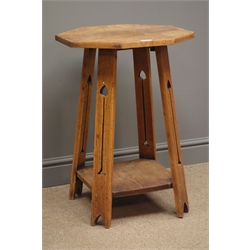  Arts & Crafts oak side table, octagonal top, four pierced supports with under tier, D51cm, H68cm  