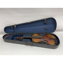 Late 19th century French three-quarter size 'Conservatory' violin with 34cm two-piece maple back and ribs and spruce top, the peg box inscribed 'Conservatory Violin Straduari', bears label 'Antonius Stradiuarius Cremonensis Faciebat Anno 1721' L55.5cm overall; in ebonised wooden 'coffin' case; and Saxony violin c1900 with 36cm two-piece maple back and ribs and spruce top; bears label 'Antonius Stradivarius Cremonensis Faciebat Anno 17**' L59cm overall; in carrying case (2)