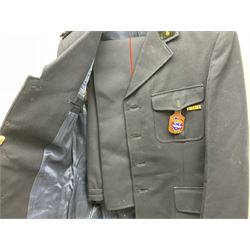 Mid 20th century French Ugeco Nantes first class dress navy blue uniform with ribbon bar with cap, and quantity of Sapeurs Pompiers patches, Sapeurs Pompiers de Caen belt buckle etc