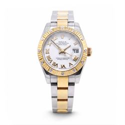 Rolex Oyster Perpetual Datejust ladies stainless steel and gold automatic wristwatch, circa 2009, Ref. 179313, serial No. V739209, white dial with Roman numeral hour markers and 18ct gold diamond set bezel, on gold and stainless steel and gold Oyster bracelet, with fold-over clasp, boxed with papers