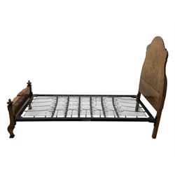 Mid-20th century walnut single bedstead, high shaped headboard, footboard with turned finials and scrollwork carvings, complete with 'Vono' iron frame, raised on cabriole supports