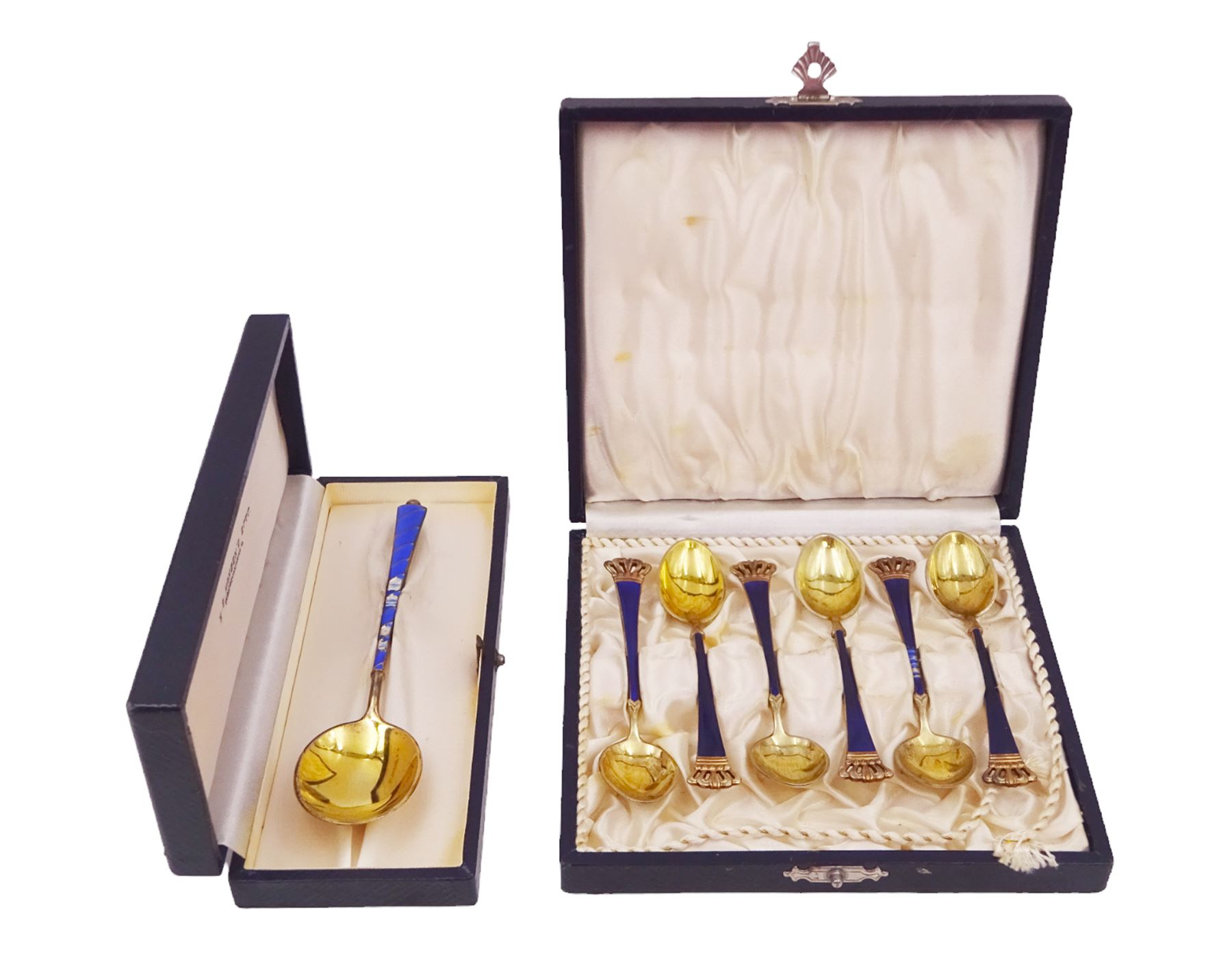 Set of six Danish silver-gilt blue enamel demitasse spoons with crown finials and together with an individually boxed example, all by Egon Lauridsen, stamped ELA Denmark Sterling 925S, both in fitted cases