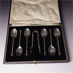 Set of six silver seal top coffee spoons and tongs Sheffield 1924 Maker Cooper Bros & Sons Ltd, cased and a set of six silver bead knop coffee spoons, cased