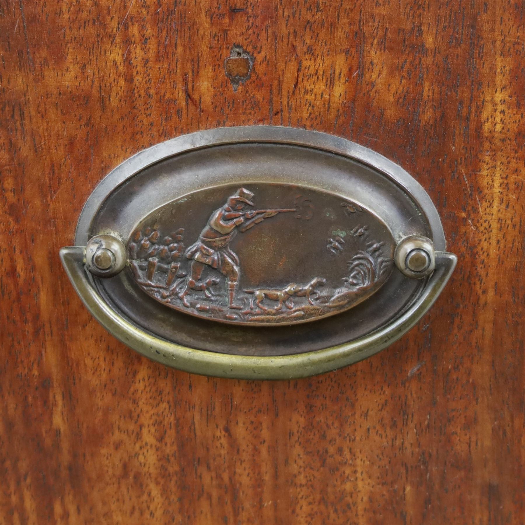 George III mahogany chest on chest, moulded cornice over two short over two long drawers with figured mahogany veneers, lower section fitted with three further long drawers, oval brass plate handles and escutcheons, on shaped bracket feet
