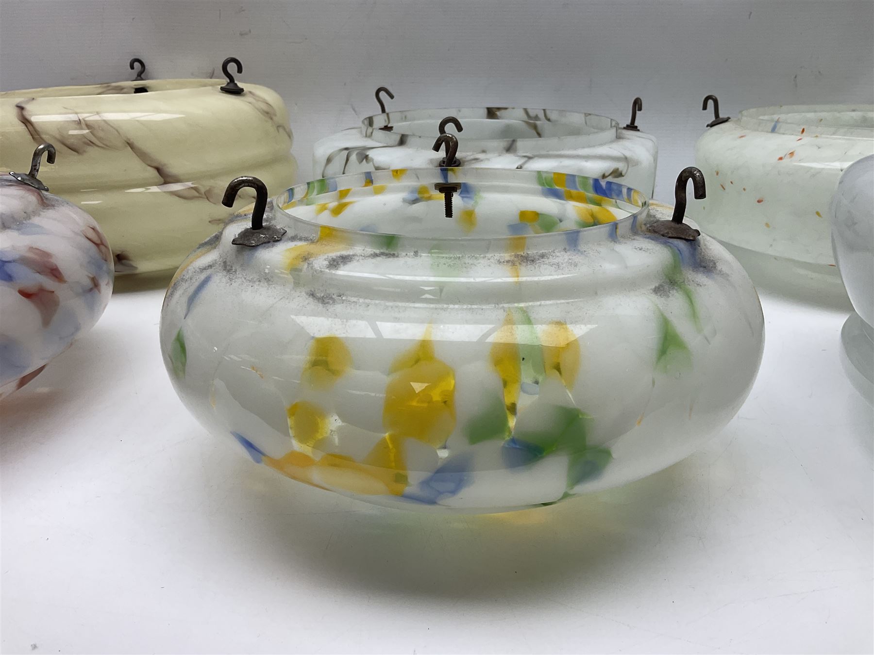 Six Art Deco glass fly catcher light shades, including marbled, mottled and frosted glass examples, largest D31cm