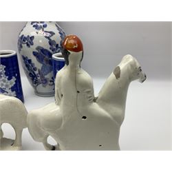 Pair of Staffordshire flat back jockeys on horseback, Chinese blue and white ceramics, two composite bull figures, three Chinese carved soapstone animals and other ceramics, in one box