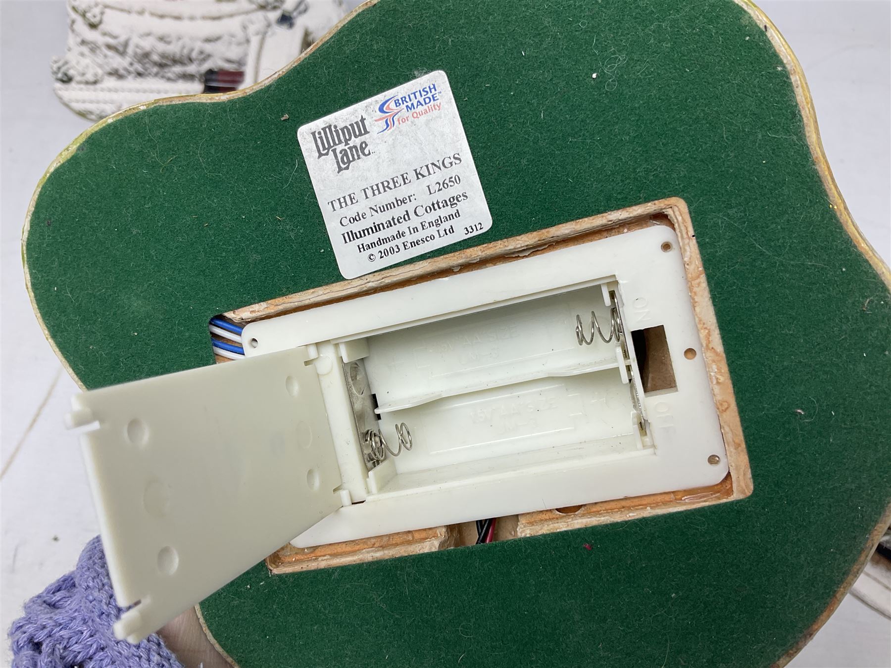 Five Lilliput Lane Illuminated Cottages, comprising Christmas is Coming, with box and deed, Christmas at Mol's, with box and deed, Christmas in Canterbury, with box and deed, Christmas Lights at Sweet Delights and The Three Kings, with box and deeds, together with twelve other Lilliput lanes, to include The First Noel, with box and deed, Winters Moonlight, Yuletide treats, with box and deed etc (17)