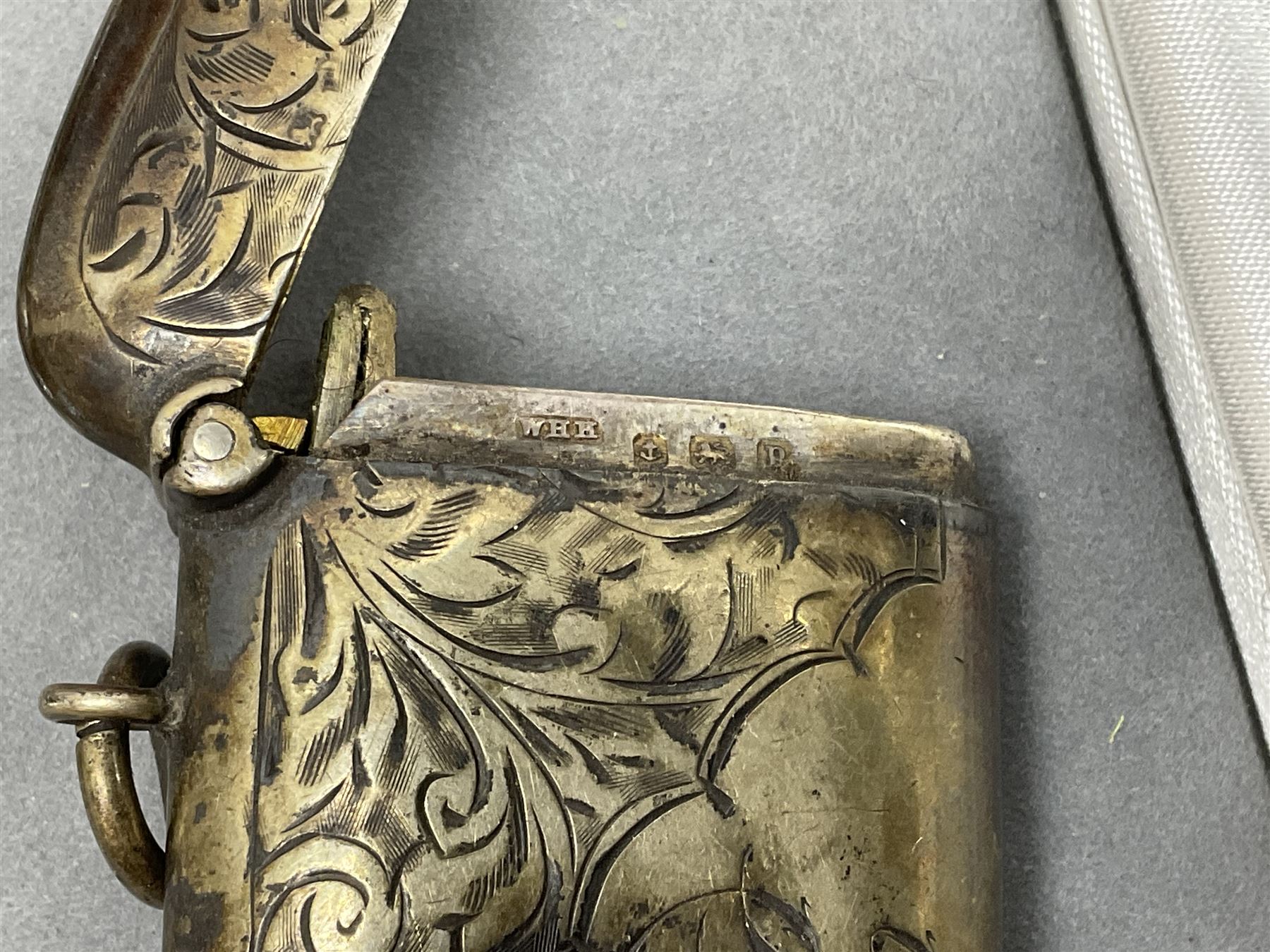 Victorian and later silver jewellery including engraved oval locket pendant, bangle, fob watch, vesta case, faux pearl necklace, butterfly wing pendant etc, a collection of costume jewellery including beaded necklaces, brooches, earrings, ladies wristwatches and a small collection of coins including two pre 1947 half crowns 