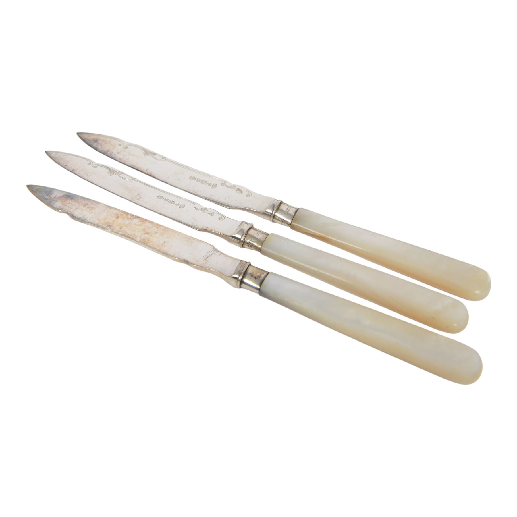 Set of six fruit knives and forks, with mother of pearl handles and silver collar, together with three silver plated toast racks, Askew twin handled tankard and two others   