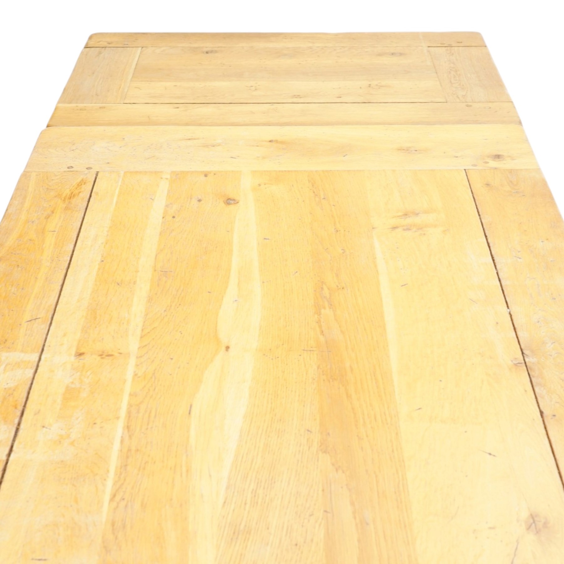 Modern solid oak extending dining table and eight upholstered chairs, the table of plank top construction raised on square supports, extended to 231cm with leaves 