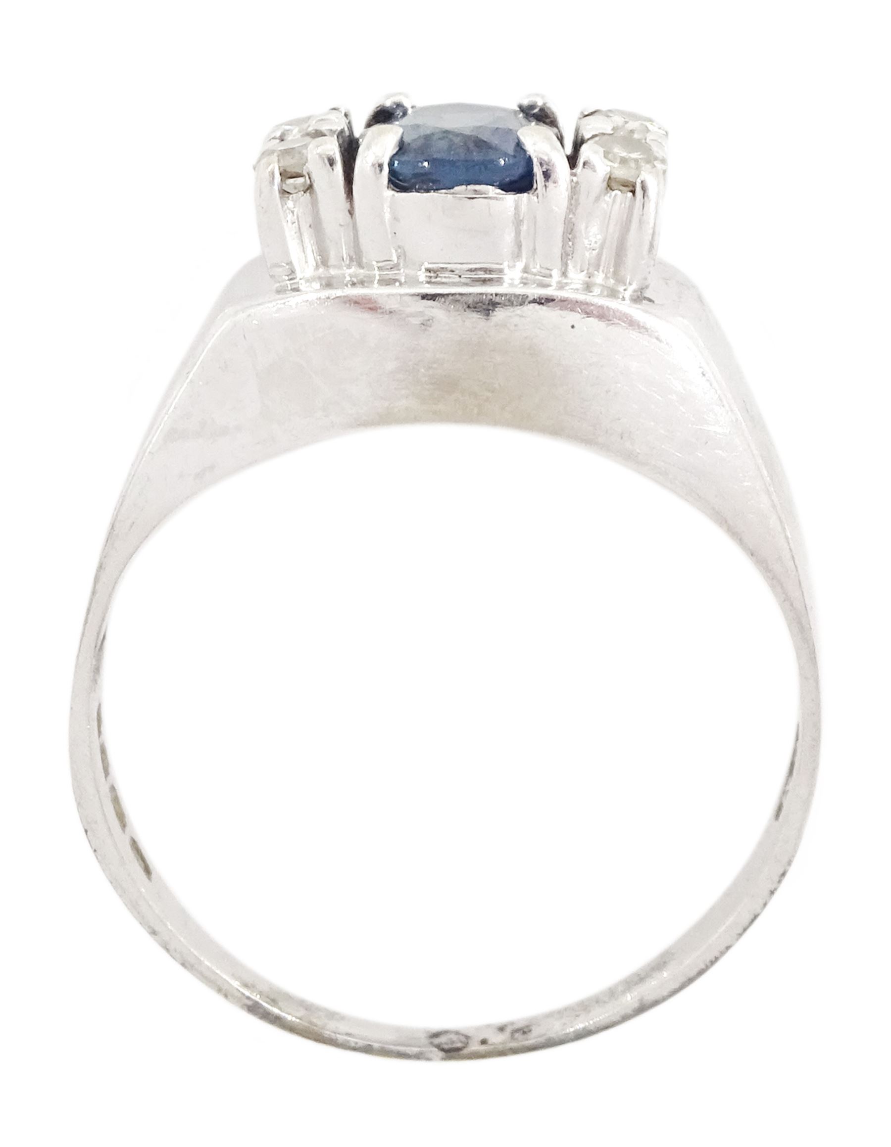 18ct white gold oval cut sapphire and four stone, round brilliant cut diamond ring, hallmarked, sapphire approx 0.60 carat