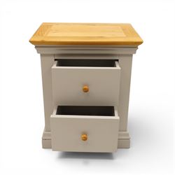 Modern bedroom suite comprising; a dresser, blanket box, bedside table, oak tops over a pale blue with wooden turned knobs

Dresser (H 77cm, D 48cm, W 107cm)
Blanket box (H 51cm, D 48cm W 91cm)
Bedside table (H 64cm, D 39cm, W 54cm)