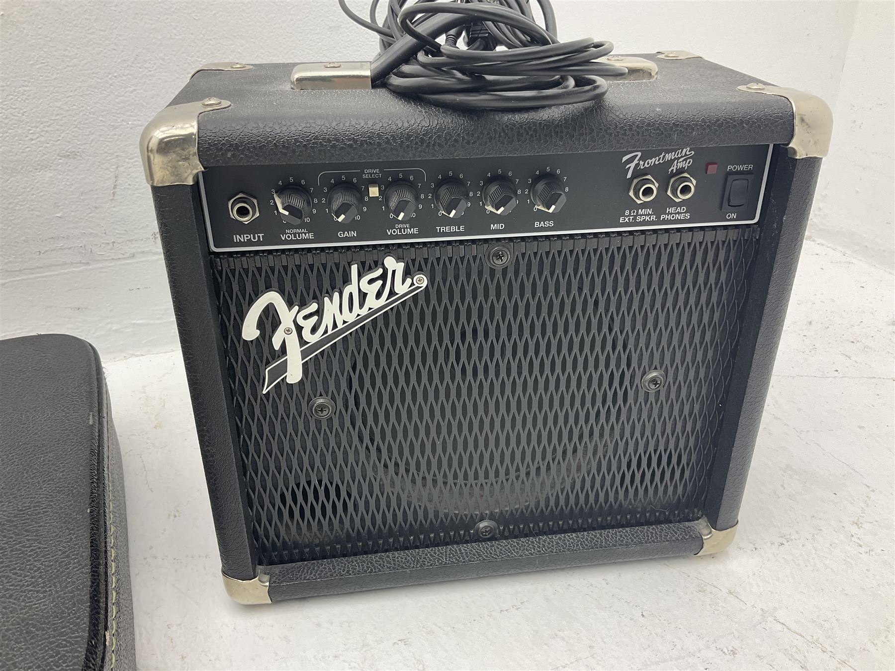 Fender style sunburst electric guitar with manuscript mark 'Zenta Stratocaster 1963' L97cm; in hard carrying case; another similar unmarked sunburst electric guitar; in gig bag; and Fender Frontman Amplifier, serial no.M473406 (3)