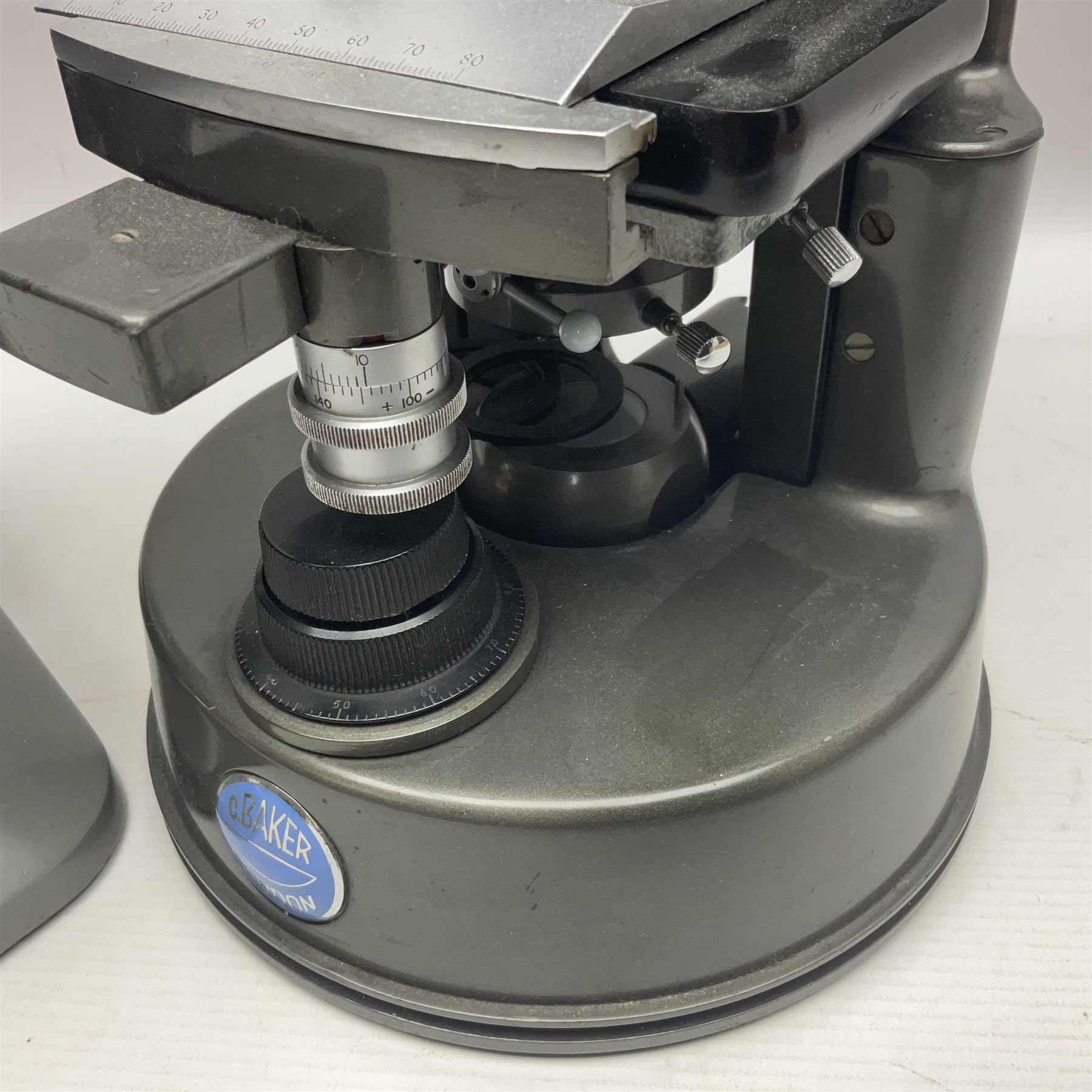 Four microscopes, comprising C Baker London Vickers, Back Diamax no 40956, Opax ABF no 232733 and one other 