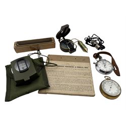 Trough compass and two other modern hand held compasses, compensated barometer, Smiths stop watch, Douglas combined protractor and parallel rule, etc
