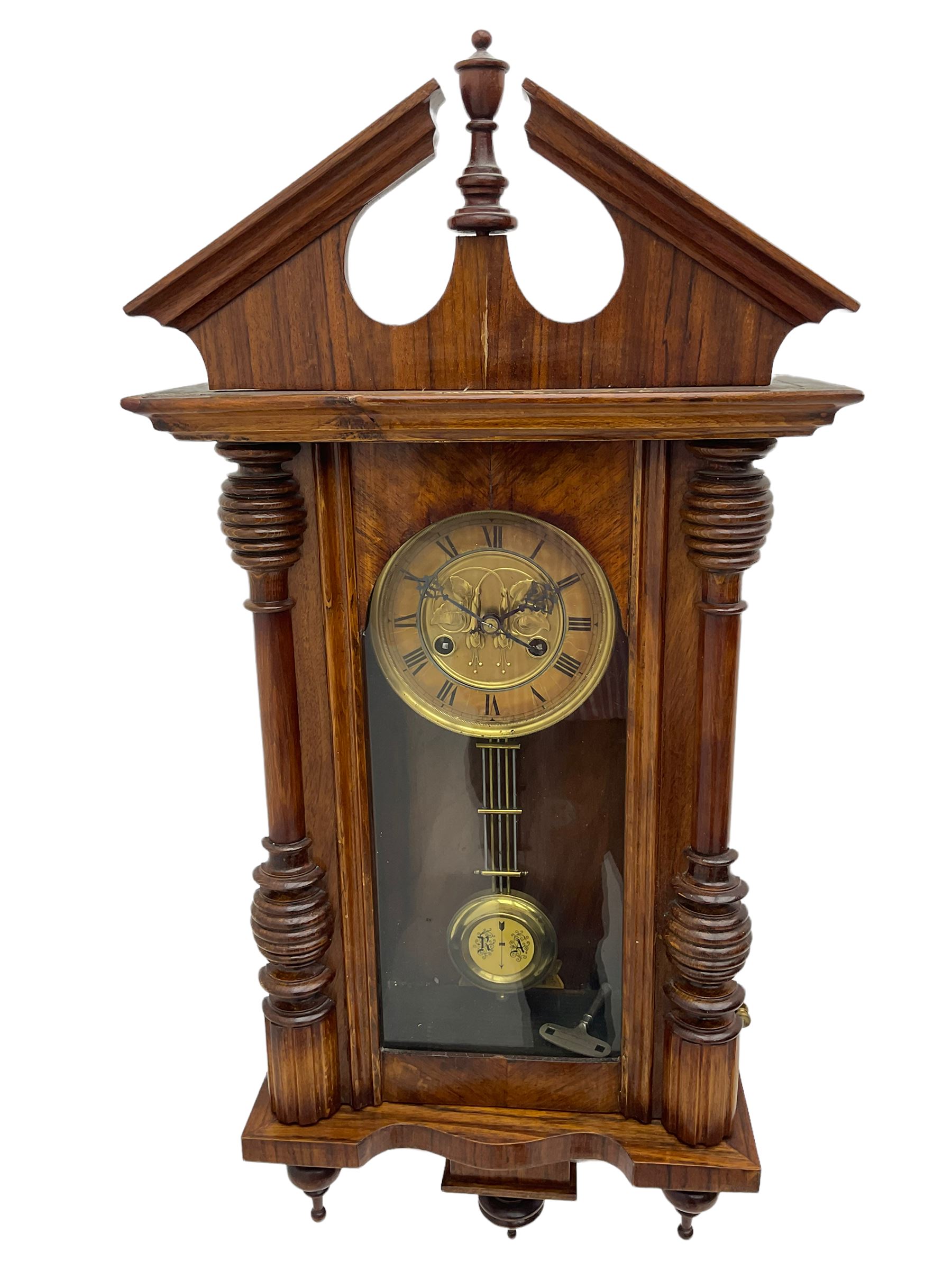 German early 20th century wall clock in a mahogany case with an