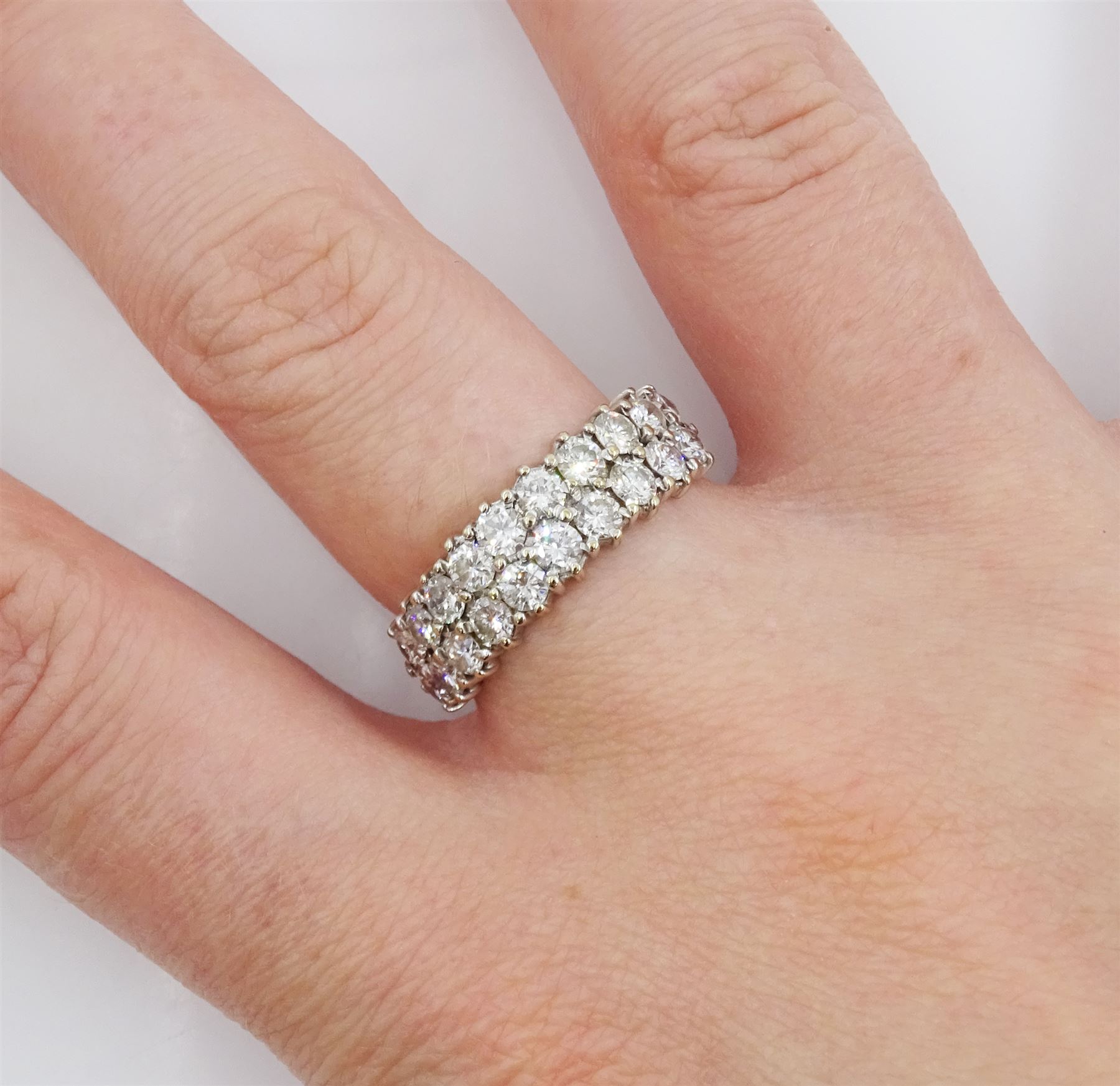 18ct white gold two row round brilliant cut diamond half eternity ring, stamped 18K, total diamond weight approx 1.40 carat