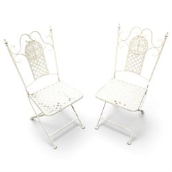 Pair of Victorian design wrought metal folding garden chairs, scrolled cresting rail over pierced foliate medallion, lattice back and seat on X-frame folding base