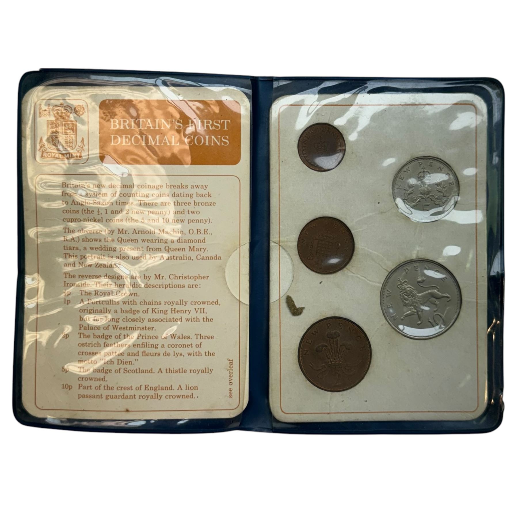 Approximately 95 grams of Great British pre 1947 silver coins, other pre-decimal coinage, commemorative crowns, Britain's first decimal coins in blue wallet, world coins etc