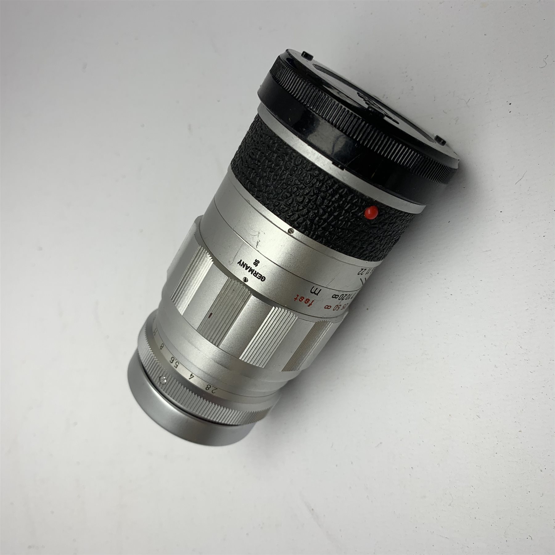 Leica M2-1013180 camera fitted with Leica Summicron 1:2/50 Leitz Wetzlar lens (1764800) and UVa filter, and Leica-Meter MR in leather case together with; Leica Elmarit 1:2.8/90 LW lens (1805634), Leica Summaron 1:28/35 LW lens (1782507), Leica M3 M2 adapter ring, Leica filters yellow and orange cased, three Leica lens hoods IUFOO, IROOA and 12585H (boxed), Leica pocket book, guide and 1960s survey catalogue & price guide leaflet, with original M2 camera box