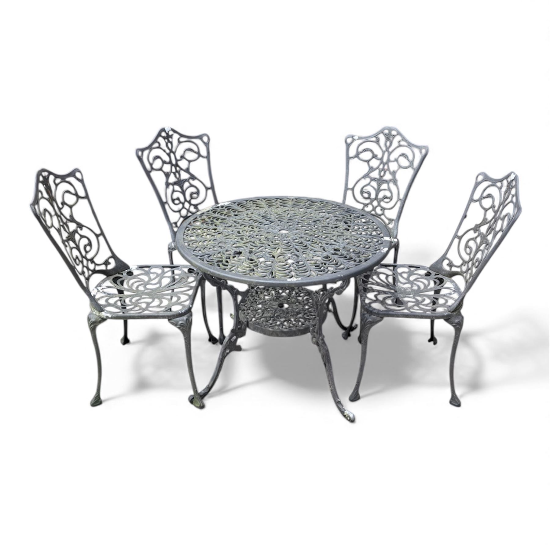 Cast aluminium garden table and four chairs in dark grey