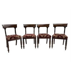 Set four William IV mahogany dining chairs, shaped and rolled cresting rail on moulded and carved uprights, upholstered in floral patterned fabric, on turned front supports