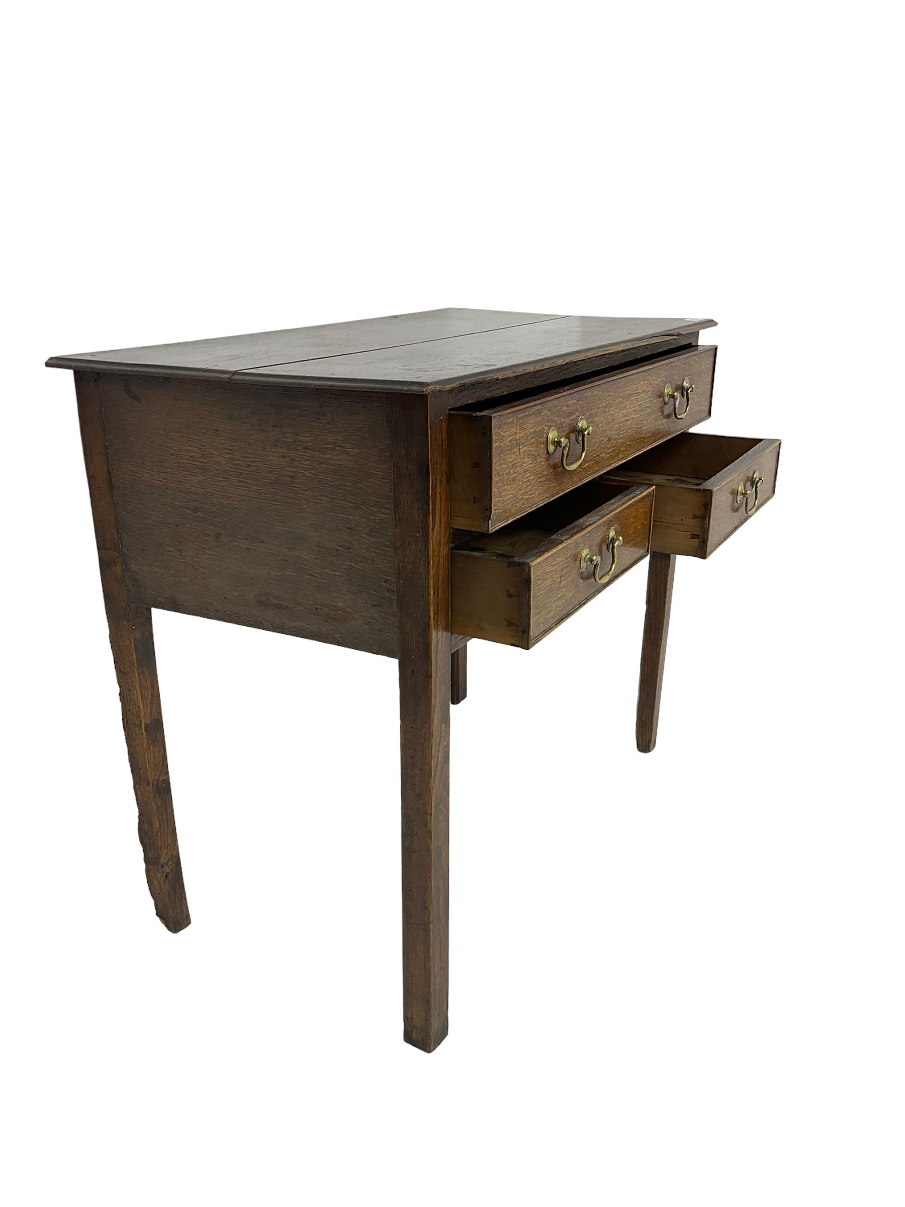 Georgian oak lowboy, rectangular moulded top over three drawers, on square supports