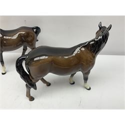 Four Beswick horses, including Exmoor no 1645, Black Beauty foal and two others 