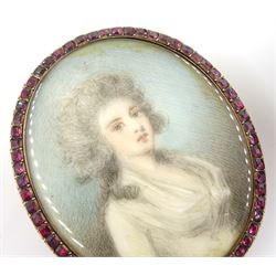 British School (18th century and later)
Two portrait miniatures upon ivory
The first example a head and shoulder portrait of a young woman wearing a white gown
In period gold brooch mount with garnet border 
Oval 4cm x 3.25cm
The second a head and shoulder portrait of a young girl in blue and white dress
In gilt brooch mount with hair work panel verso
Oval 4.5cm x 3.5cm
