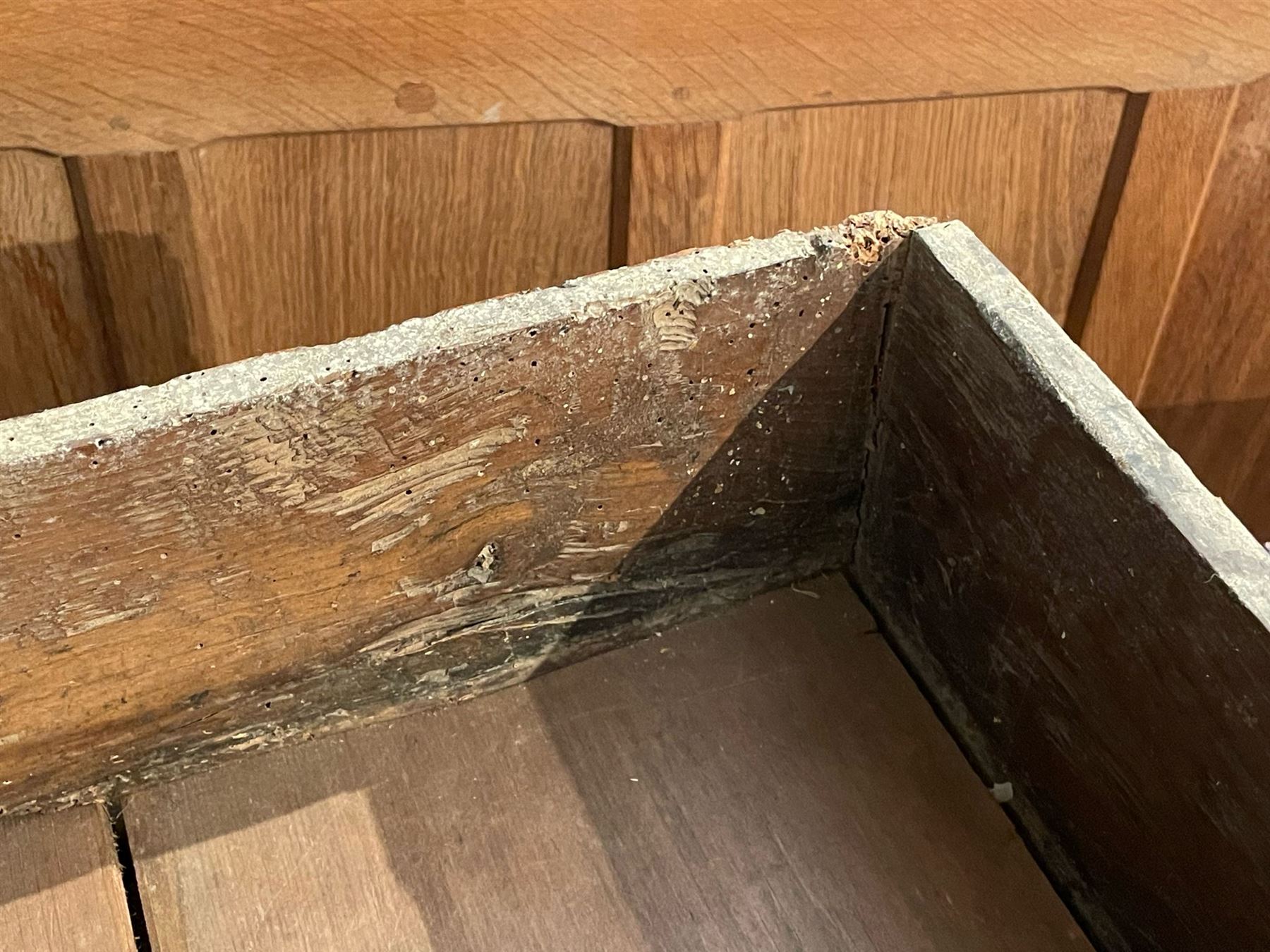 18th century oak dresser base, moulded rectangular top over two drawers and shaped apron, moulded drawer fronts fitted with shaped brass handle plates and swan neck handles, on chamfered square supports united by pot board base 