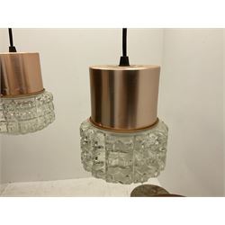 Mid century teak light fitting with three drop down clear glass pendants and copper mounts, H54cm 