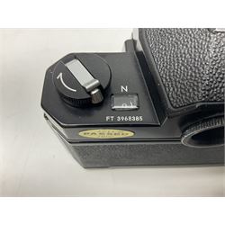 Nikkormat FT2 camera body, serial no. 5066813, in original packaging, together with Nikkormat EL camera body, serial no. 5577358, with Nikon Nikkor 50mm 1:1.8' lens no. 2143575, Nikkormat FT, serial no. 3968385, and Nikomat FT camera body, serial no. 4015491