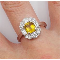 Platinum emerald cut yellow sapphire, baguette and round brilliant cut diamond cluster ring, stamped Plat, sapphire 1.30 carat, total diamond weight 0.55 carat, with World Gemological Institute Report