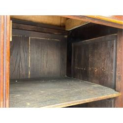 The Shannon Limited - late Victorian walnut filing cabinet, fitted with twenty-four small filing drawers, each with brass handle with label holder, fluted uprights, double cupboard below enclosed by two panelled doors, on turned feet, with brass plaque inscribed 'The Shannon, Limited, Ropemaker St. London, E.C.'
