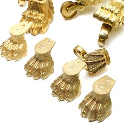 Set of four period design lacquered brass paw furniture castors by Beardmore, London, set of four matching smaller castors and a quantity of various brass castors   
Provenance: property of a Nobleman