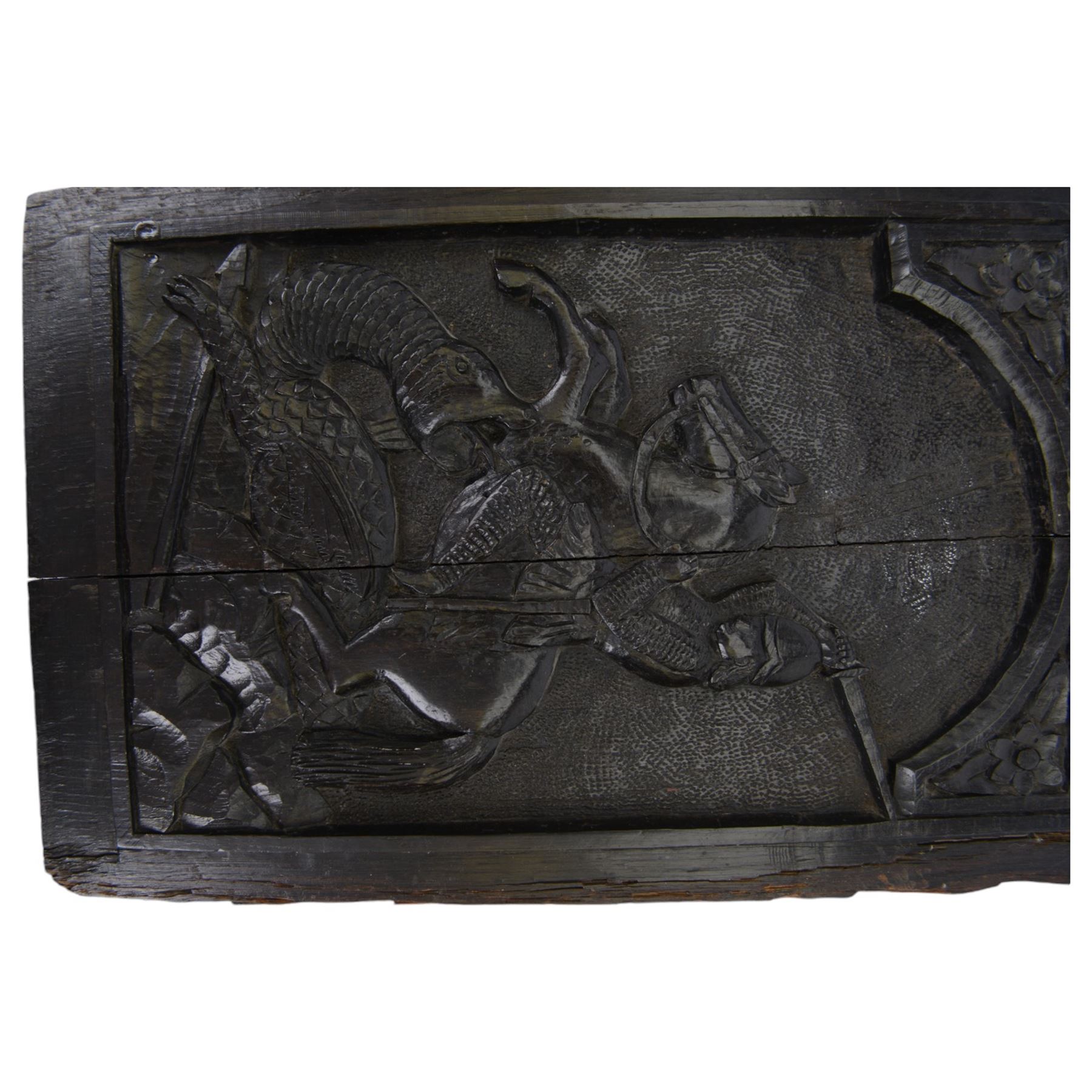 18th century carved oak panel depicting St George slaying the dragon, H38cm