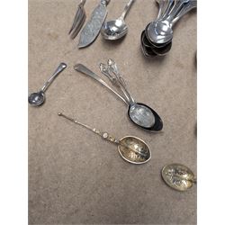 Collection of silver teaspoons, including souvenir and American silver examples, together with a silver handled fork and a mother of pearl handled silver knife, all stamped or hallmarked 