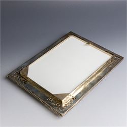 Indian silver double folding photograph frame, of rectangular form with beaded border and pierced decoration, H19.5cm