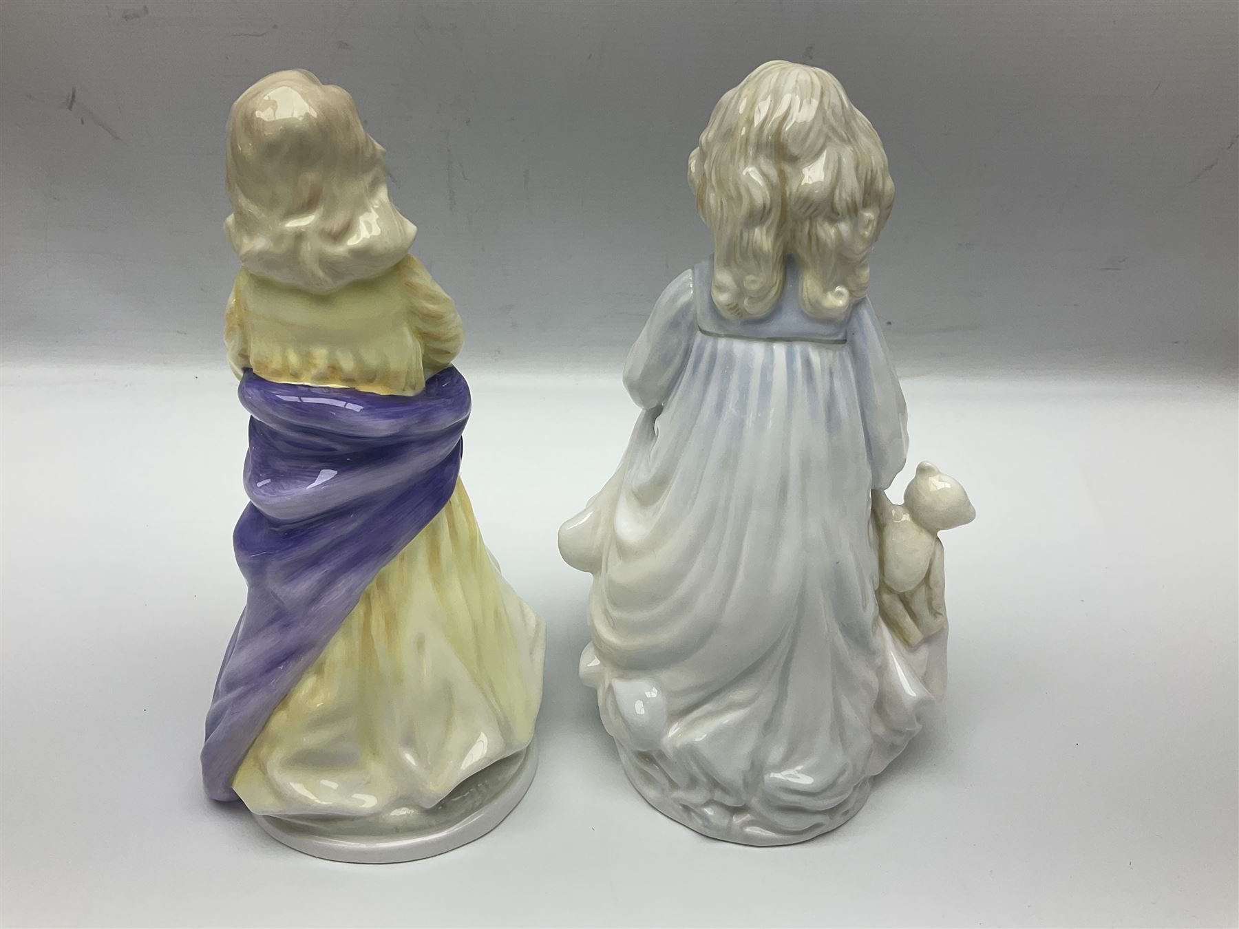 Seven Royal Doulton figures, to include Charity HN3087, Faith HN3082, Hope HN3061, Belle HN3703, etc, all with printed marks beneath