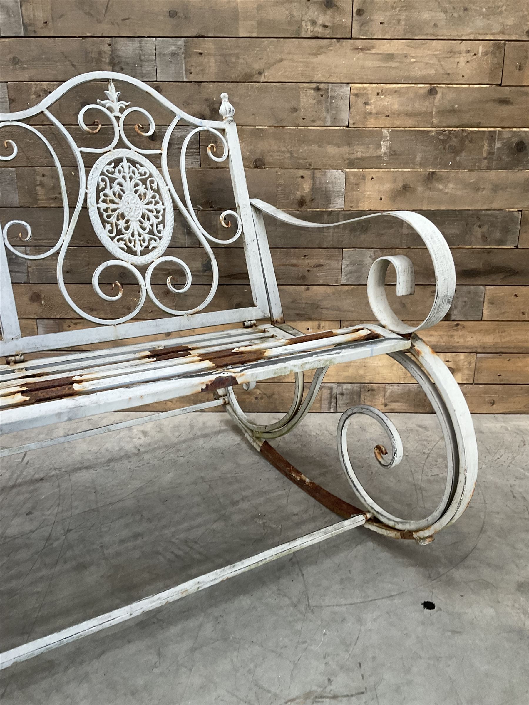 Wrought metal rocking garden bench seat, in antique grey finish
