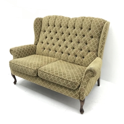 Traditional style two seat sofa, high shaped back upholstered in deep buttoned patterned fabric, cabriole feet, W146cm