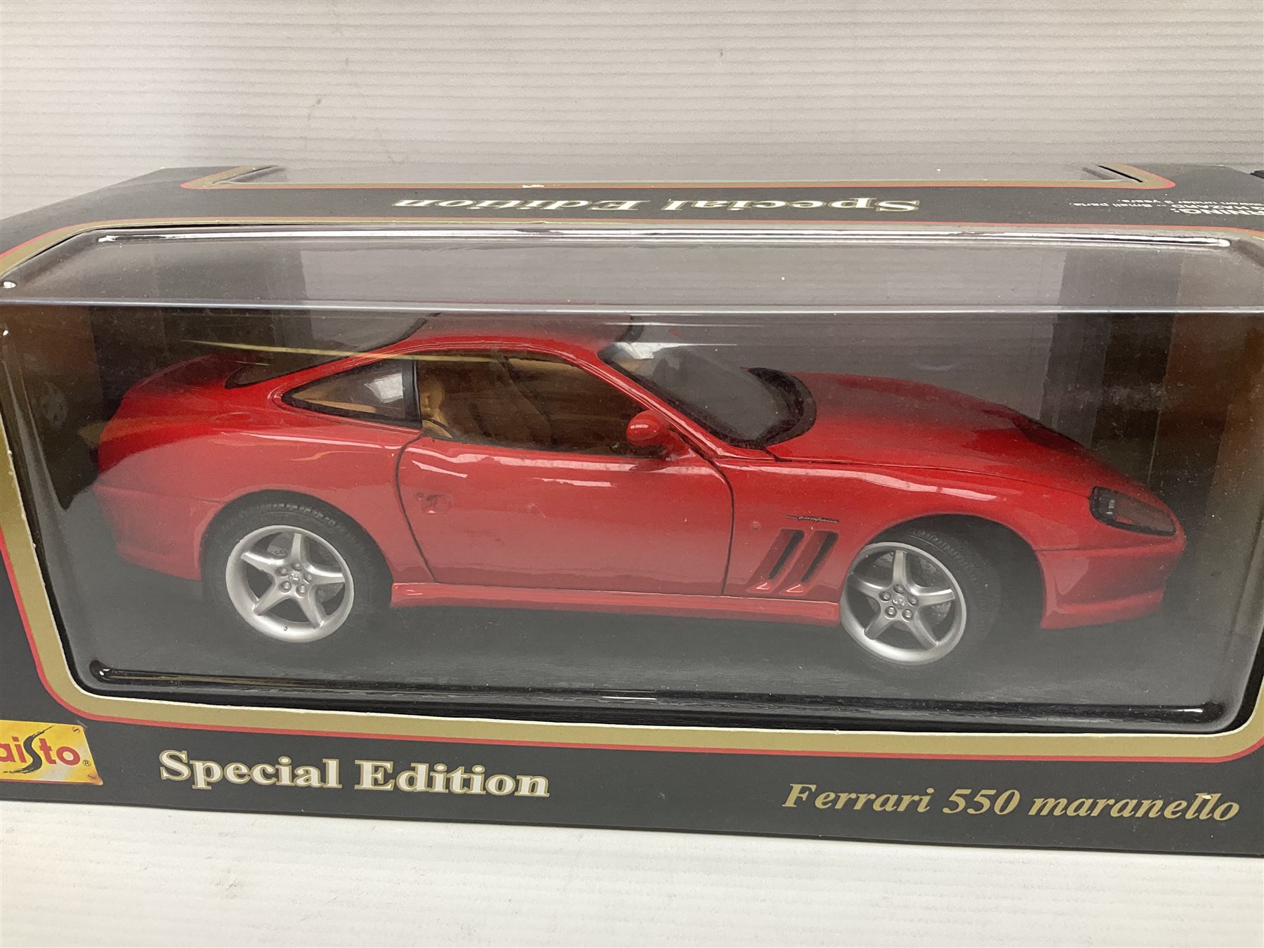 Three Maisto Special Edition 1:18 scale die-cast models - Porsche 550A Spyder, Jaguar 'S' Type and Ferrari 550 Maranello; all boxed; five other unboxed Maisto/Bburago 1:18 scale models; and two Classic Collection lead crystal models of Classic Cars (10)