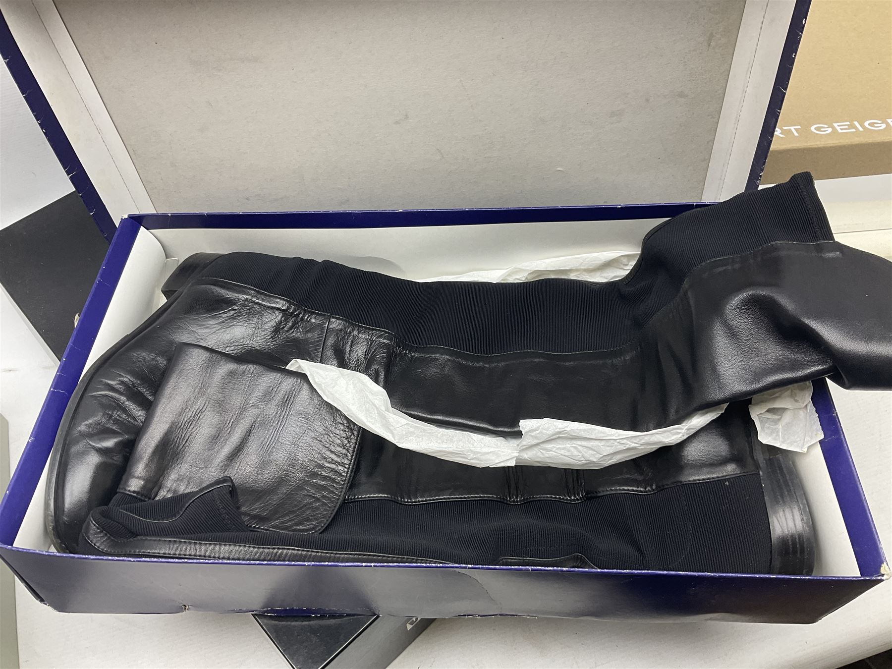 Collection of designer ladies shoes and boots, to include Donald J Pliner black court wedge, Stuart Weitzman over the knee stretch boots, Aquatalia Carmen boots, two pairs of Kurt Geiger ankle boots and Russel & Bromley Canterbury riding boots, various sizes, all in boxes (6)