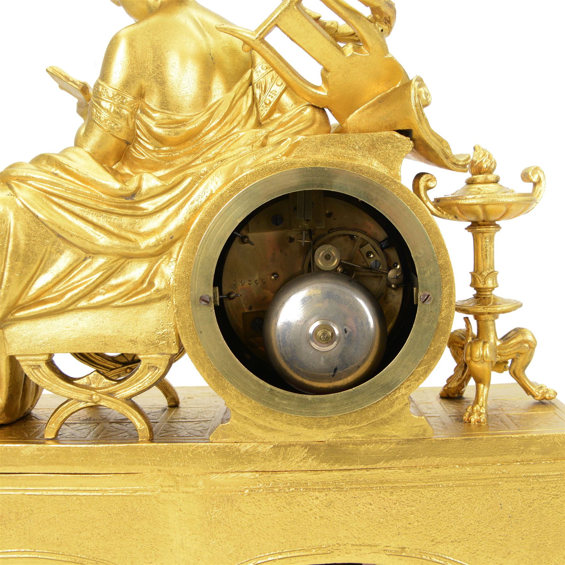 French- Napoleon III porcelain inset 8-day figural clock in a gilt case c1870, drum housed movement resting on a rectangular plinth with light blue porcelain panels each painted with different classical images and depictions from antiquity, conforming dial with a garland of flowers to the centre, gilt Roman numerals, minute track and brass spade hands, with a seated figure of a classical maiden reading a book, mounted on a matching gesso base with a velvet padded top, Parisian countwheel striking twin train movement, striking the hours and half hours on a bell. With a contemporary ebonised base and oval glass dome. With pendulum.
