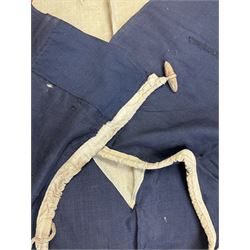 Ship's house flag, rectangular linen flag, with a white diamond and red cross to the centre, upon a cobalt blue ground, inscribed on the hoist 'Cutty Sark', H130cm, W170cm

Provenance by vendor repute: Vendor's father was a naval cadet in 1940s/50s on board HMS Worcester which was moored alongside the Cutty Sark on the River Thames at Greenhithe. He has had the flag since then. 