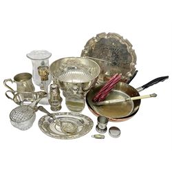 Quantity of silver plate, to include part fluted punch bowl with embossed floral decoration, single glass mounted candle sticks with etched grape vine decoration, sauce boat, salver, glass hip flask etc, together with a pair of copper frying pans 