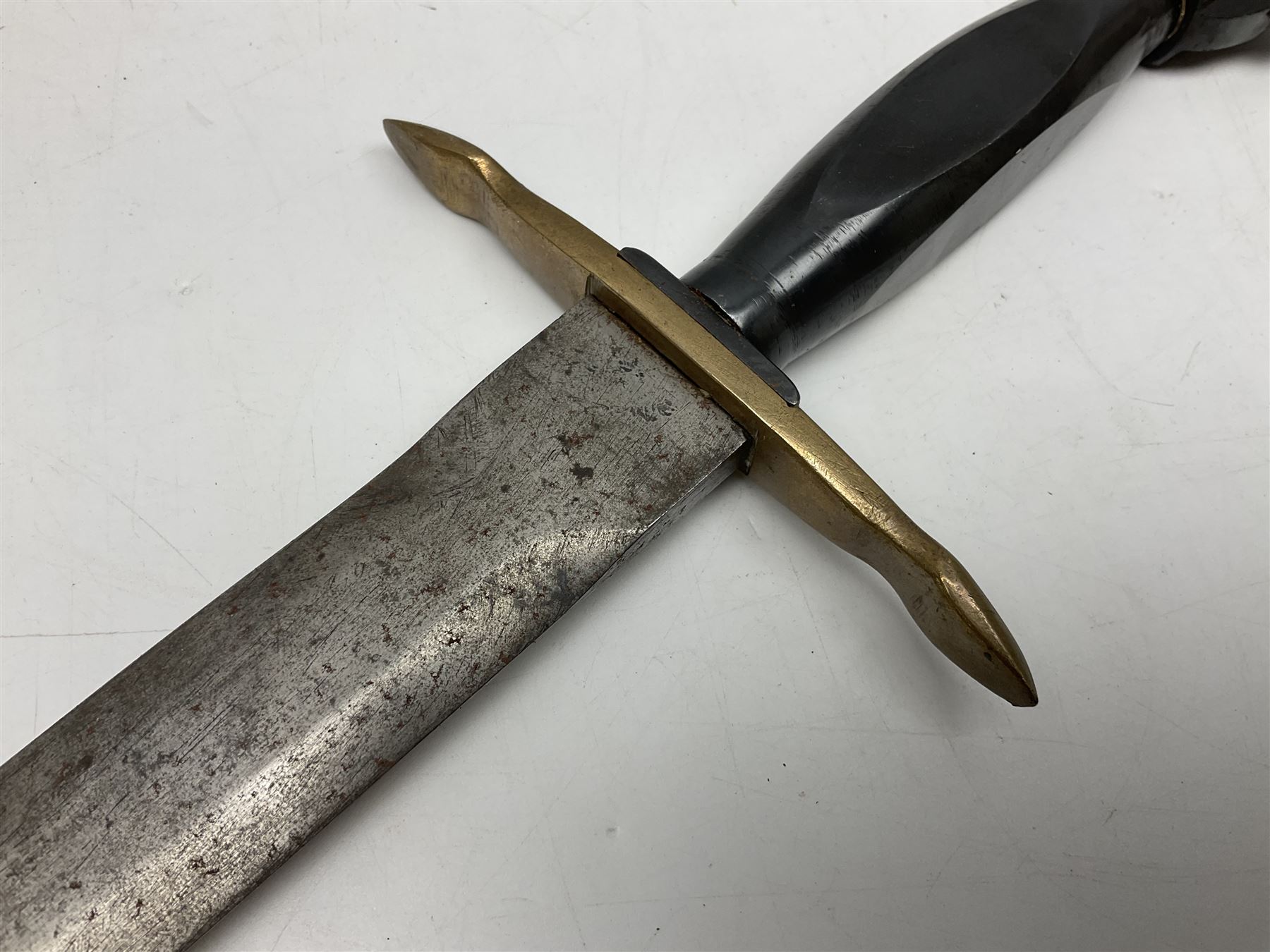 Italian Model 1891 bayonet with 30cm fullered blade; the crosspiece marked 'TERNI'; in associated brass and leather scabbard L43cm overall; and Knights Templar (?) short blade sword (no scabbard) (2)