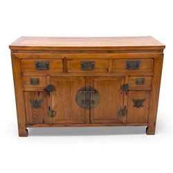 Late 20th-century Thai elm sideboard fitted with an arrangement of three drawers over a central cupboard flanked by a further two drawers, raised on square post feet 